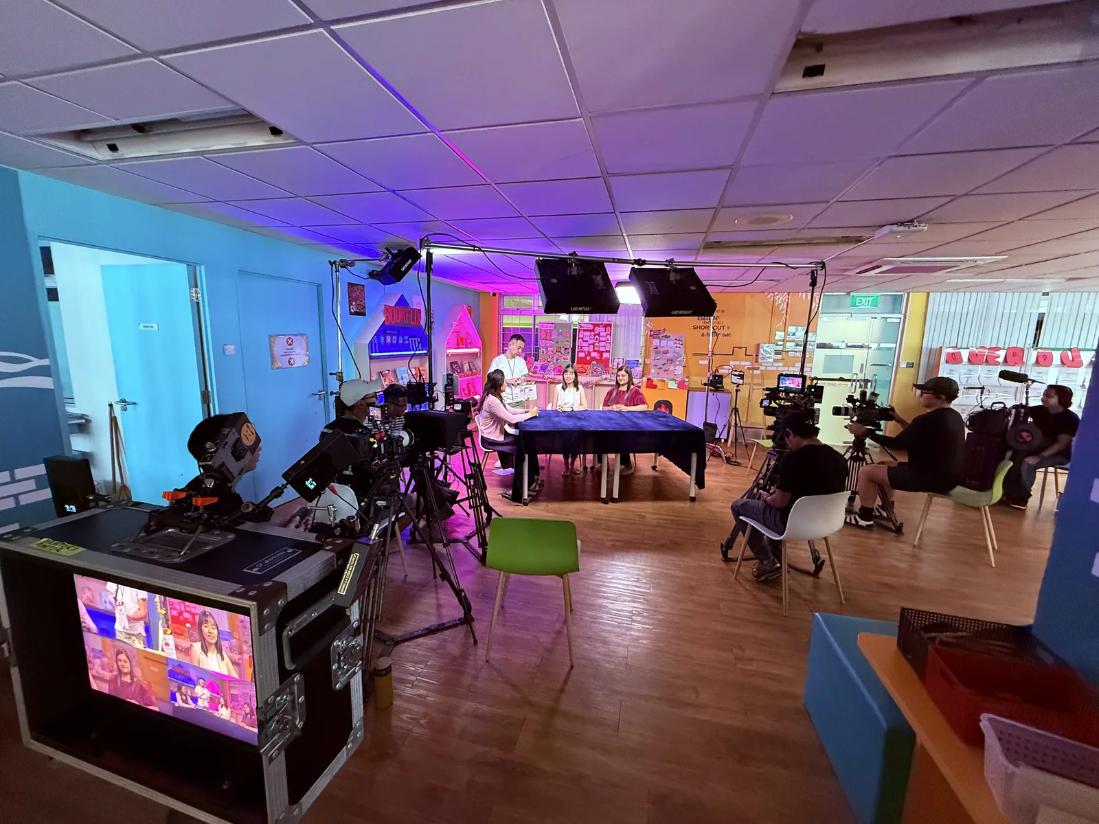 Red Ink crew and camera on a vodcast set.