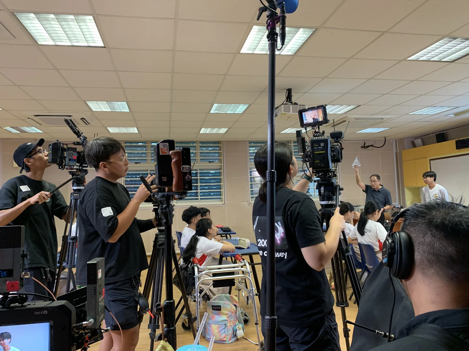 Red Ink team filming in a classroom setting
