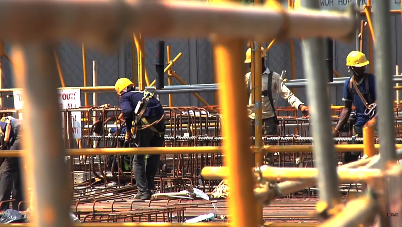 Construction workers on the D’Leedon development